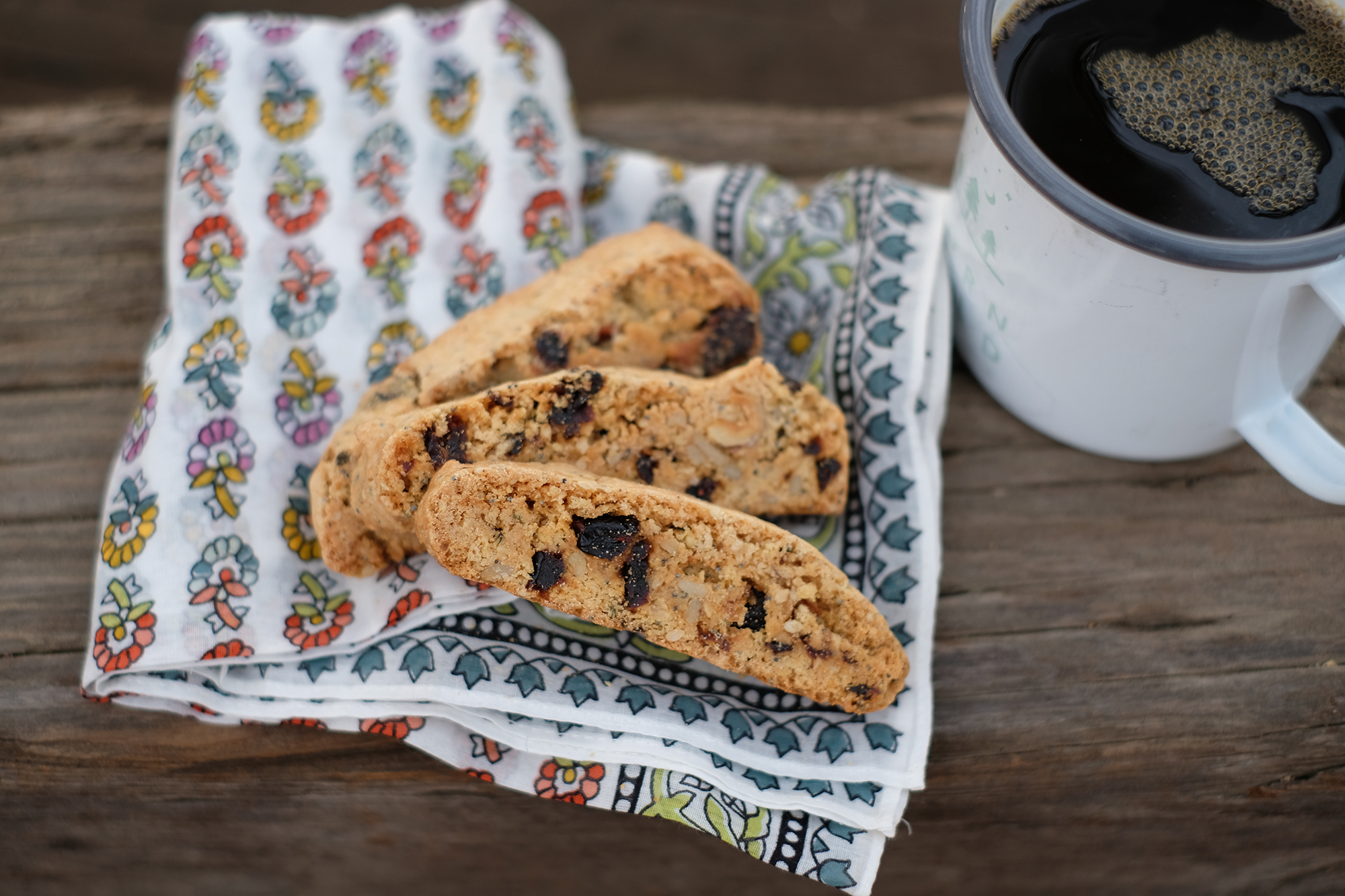 Power Biscotti stacked in a cloth-lined tin