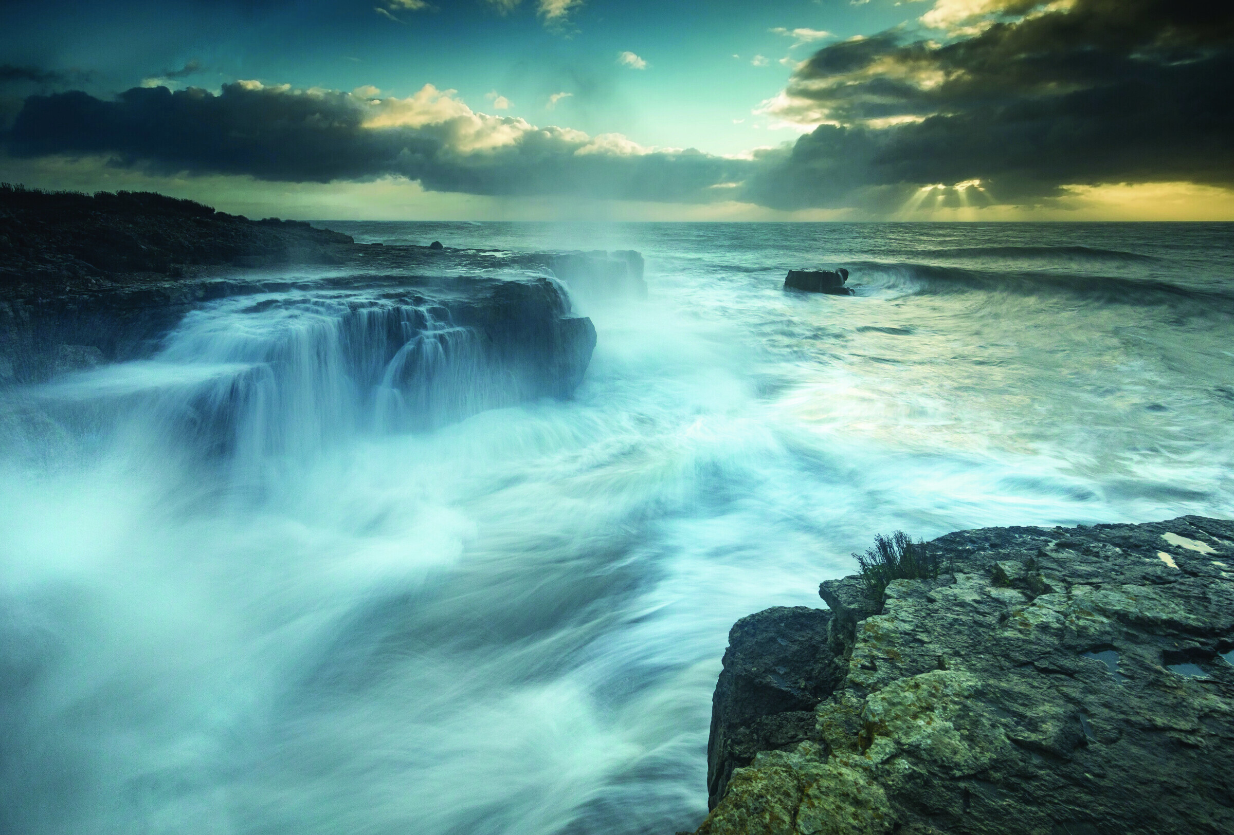 Waves crashing on a coastline