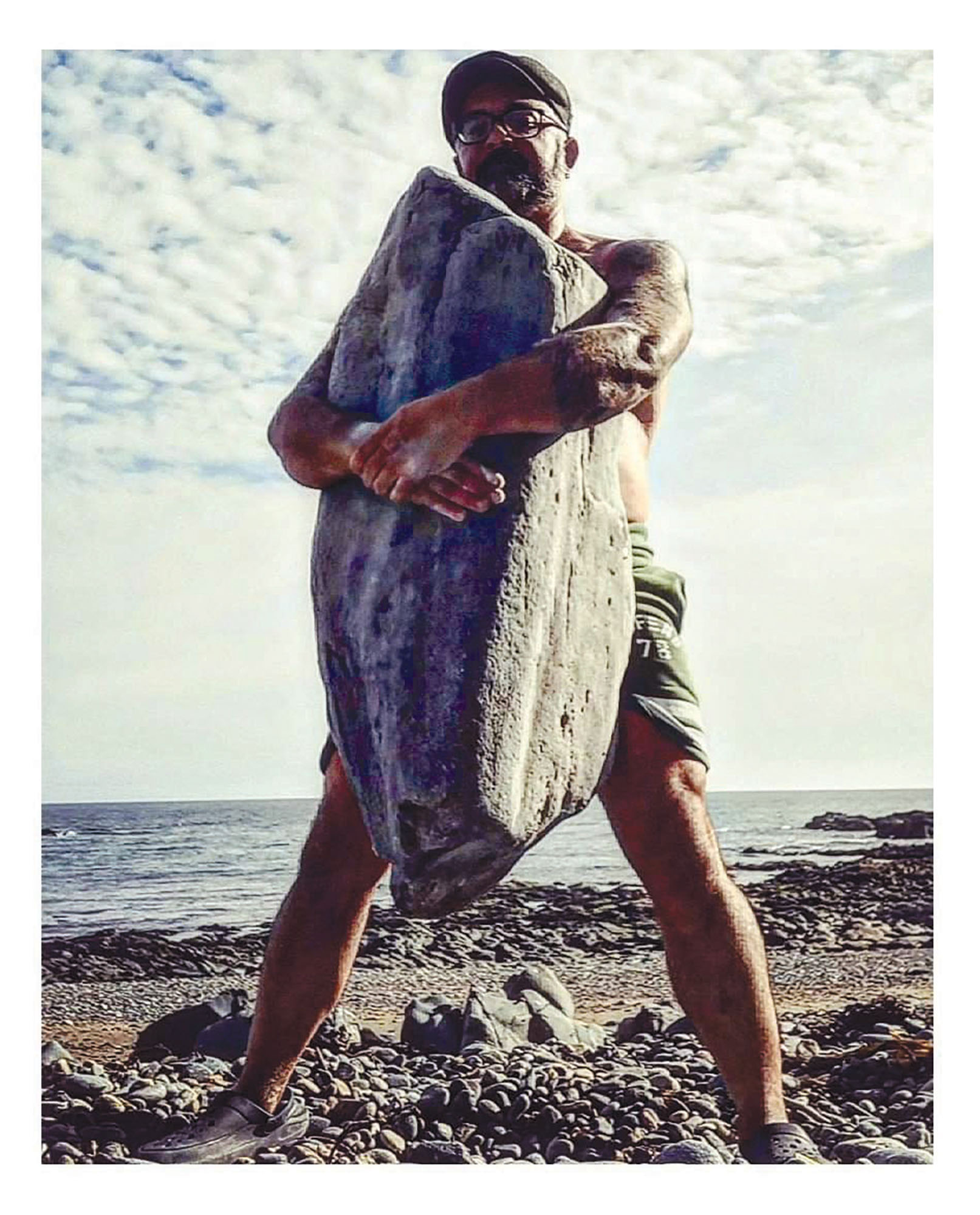 David Keohan lifting an ancient Irish stone
