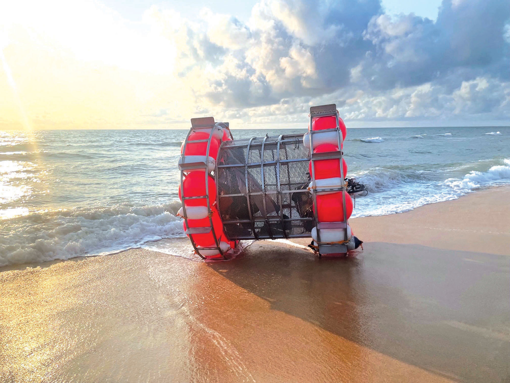 Reza Baluchi's hydro pod hamster wheel on a beach