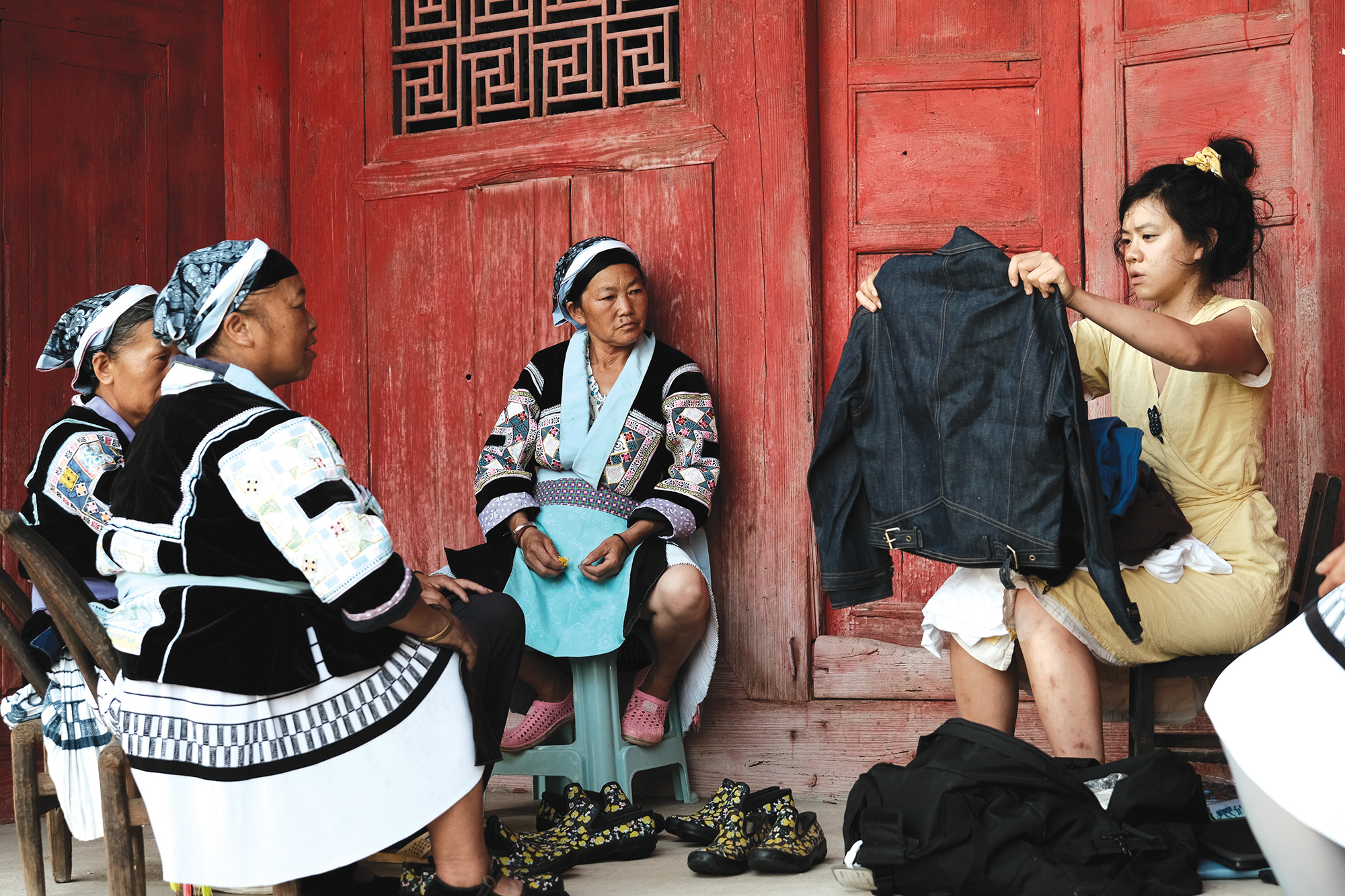 Rebecca Hui with artisans