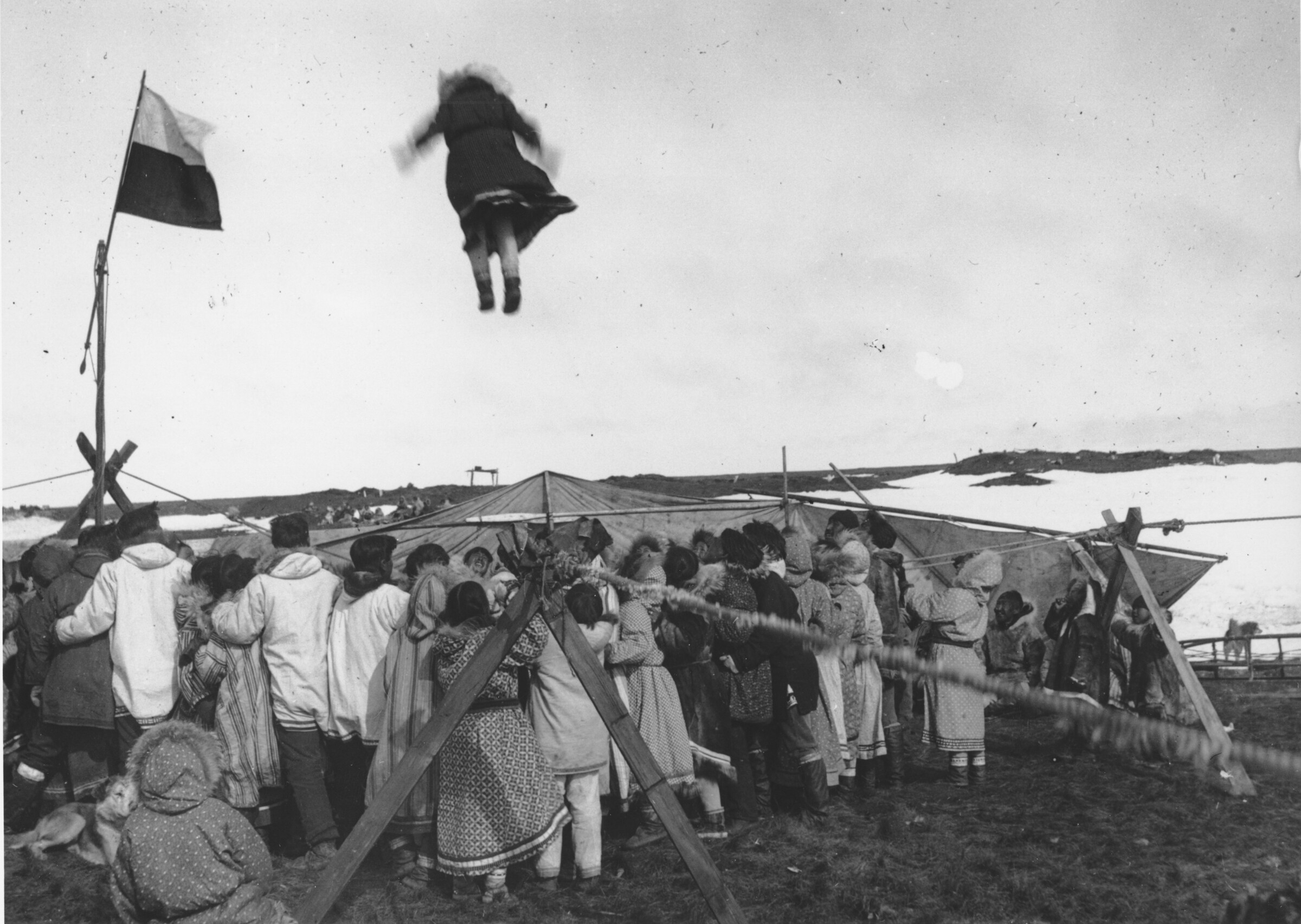 White settlers observing the Inupiat blanket toss, circa 1918